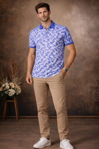 Front-facing view highlighting the all-over blue and white tropical leaf print on this stylish polo T-shirt, designed for fresh everyday wear.