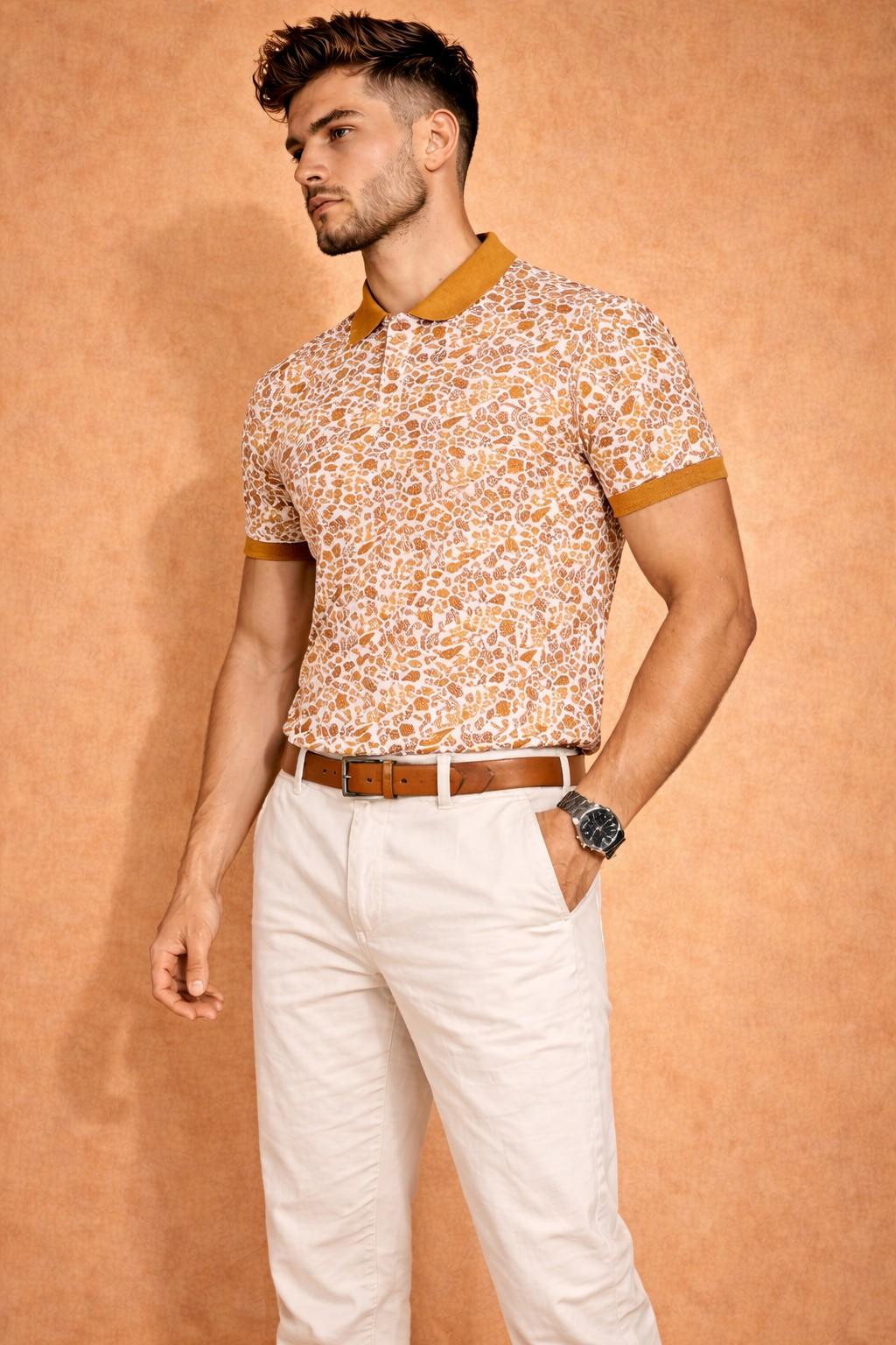 Side view of cream printed polo T-shirt with mustard accents