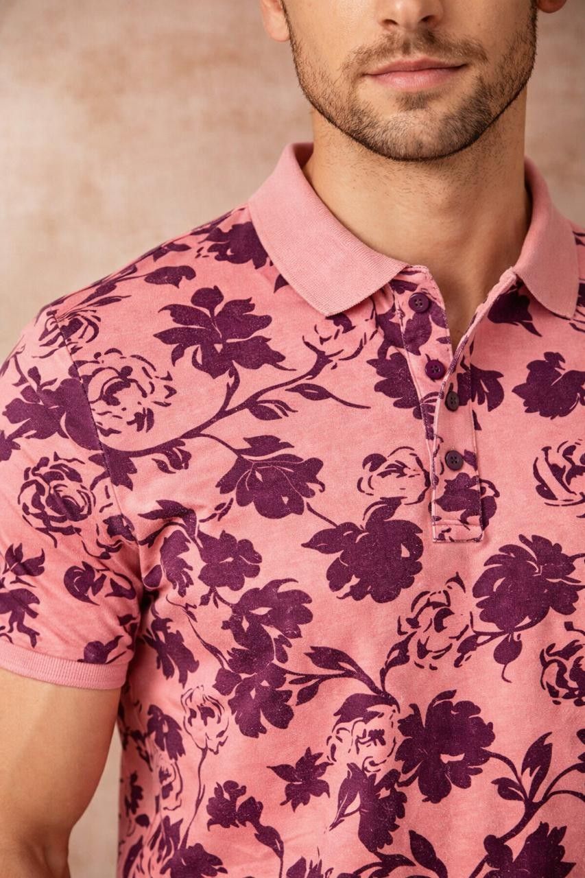 Lifestyle image displaying how the peach floral printed polo pairs effortlessly with casual outfits.